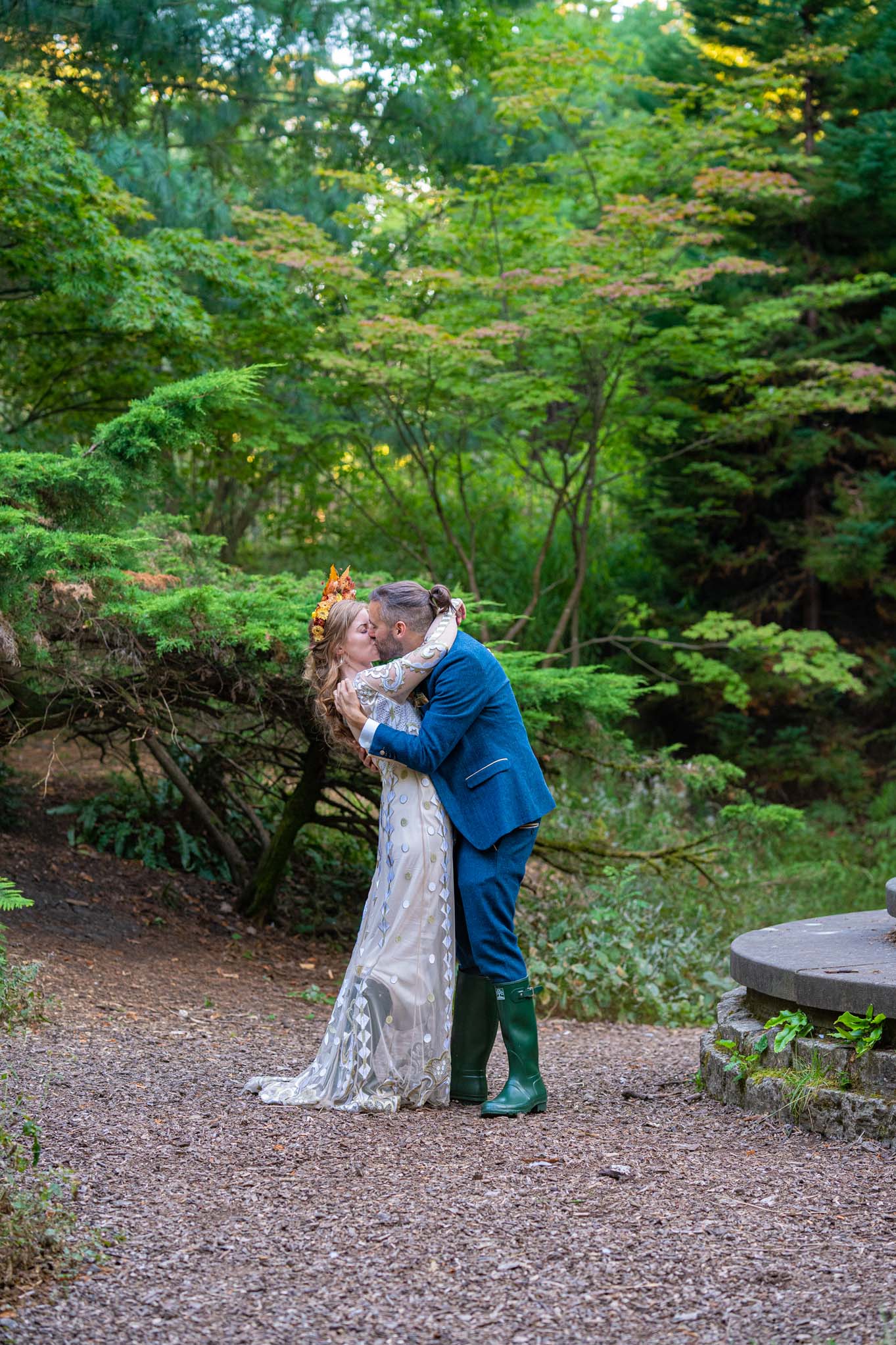 Wedding couple embrace, The Dell, Bath Botanical Gardens