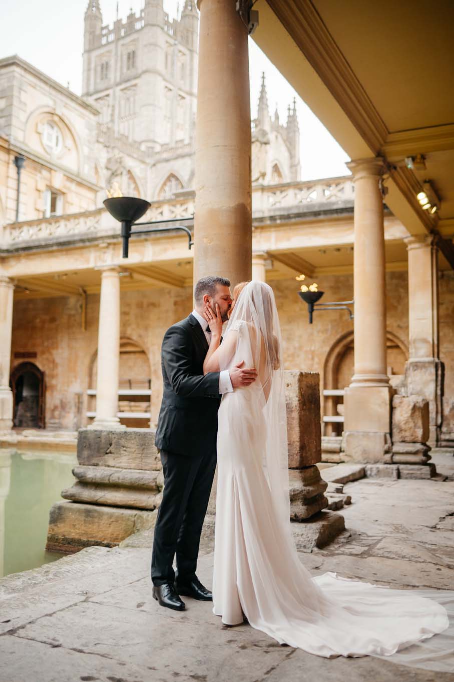 Wedding Couple kiss after exchanging vows