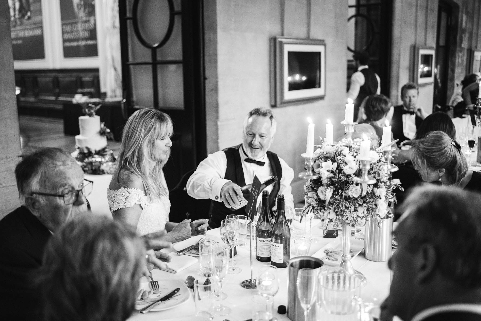 Bride and groom enjoying dinner