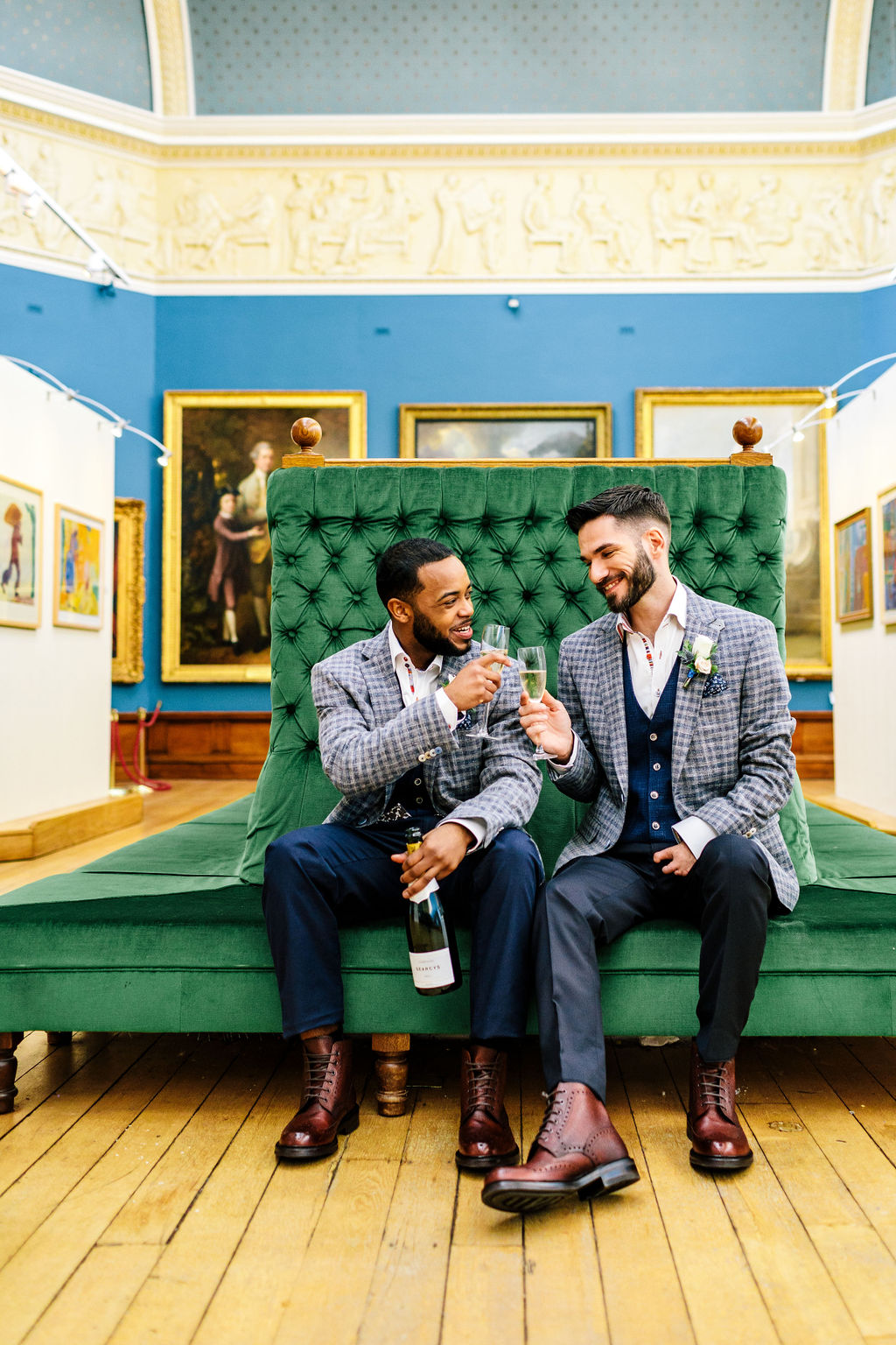 Wedding couple make a toast with Champagne in the Upper Gallery