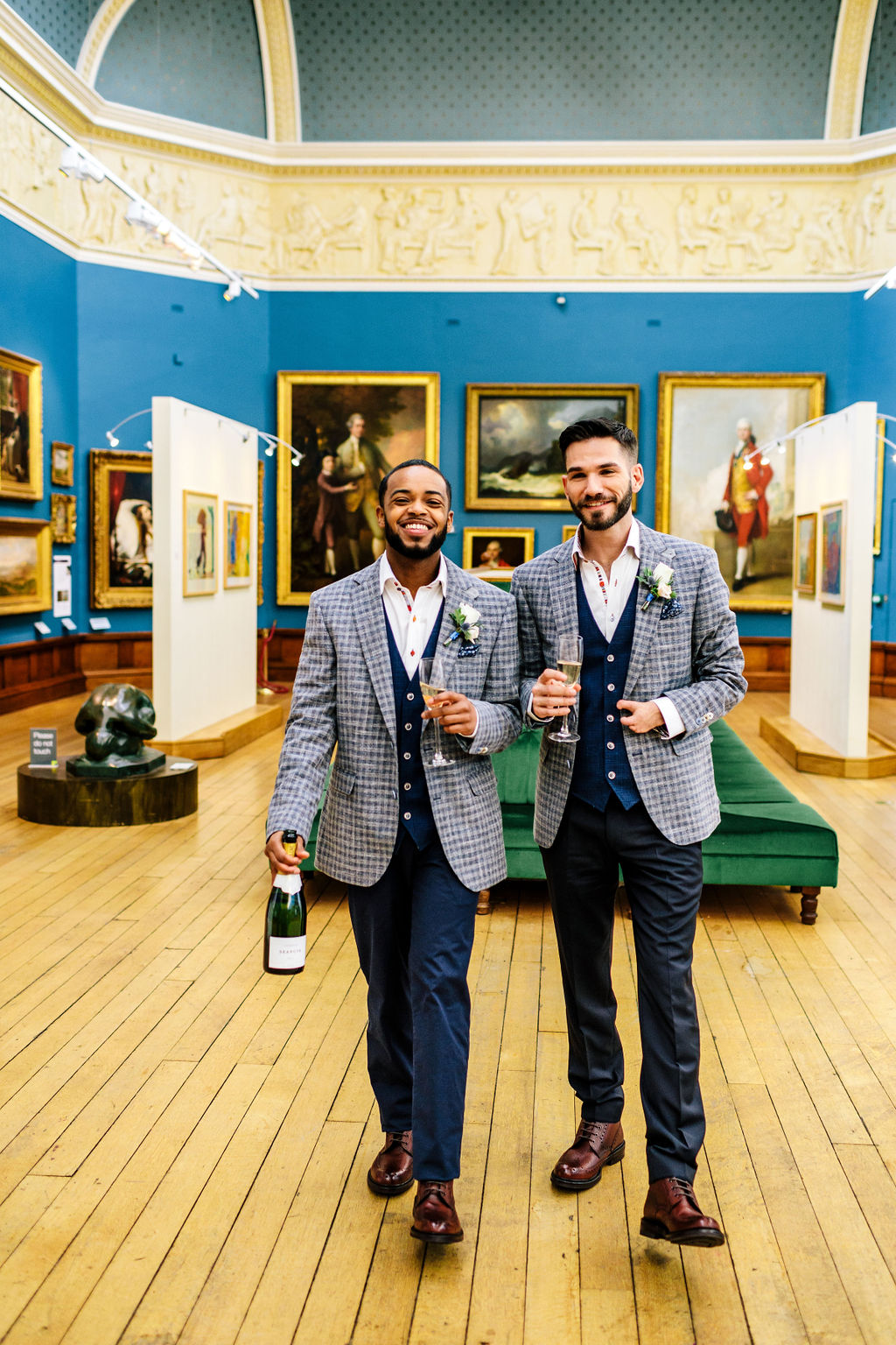 Wedding couple walk through Upper Gallery