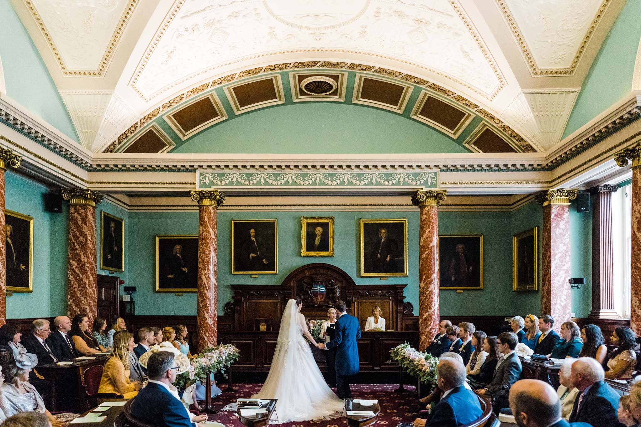 Wedding Couple exchanging vows in the Council Chamber