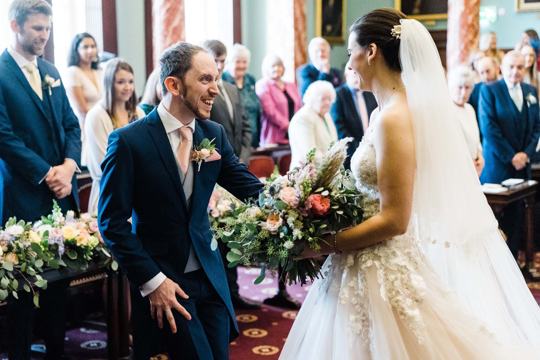 Wedding Couple exchanging vows in the Council Chamber