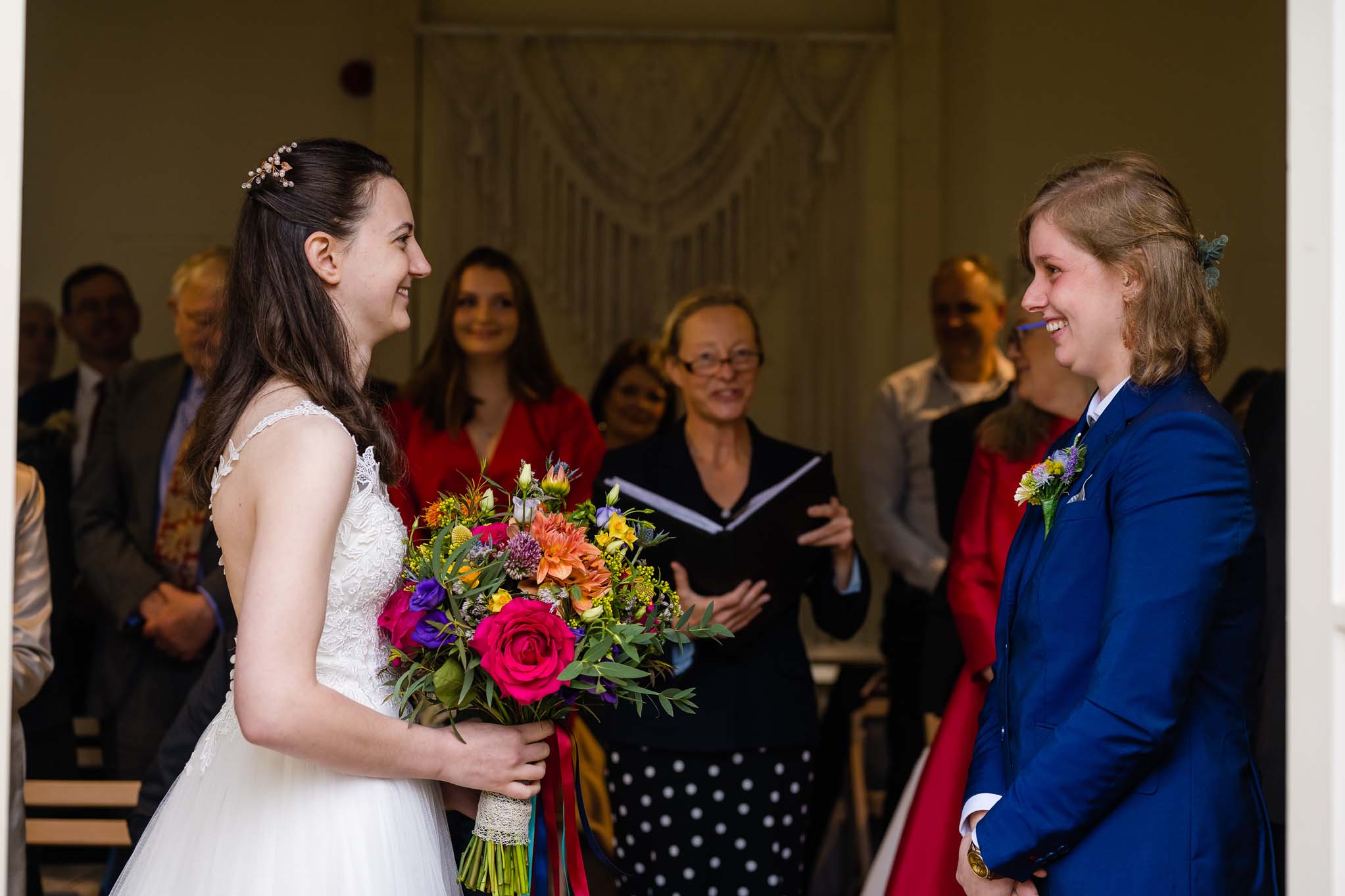 Wedding couple exchange vows at the Temple of Minerva