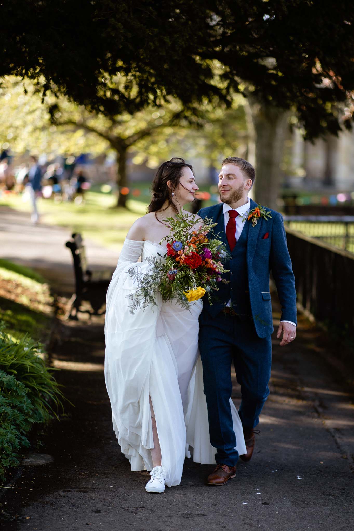 Wedding couple walking to ceremony, Parade Gardens