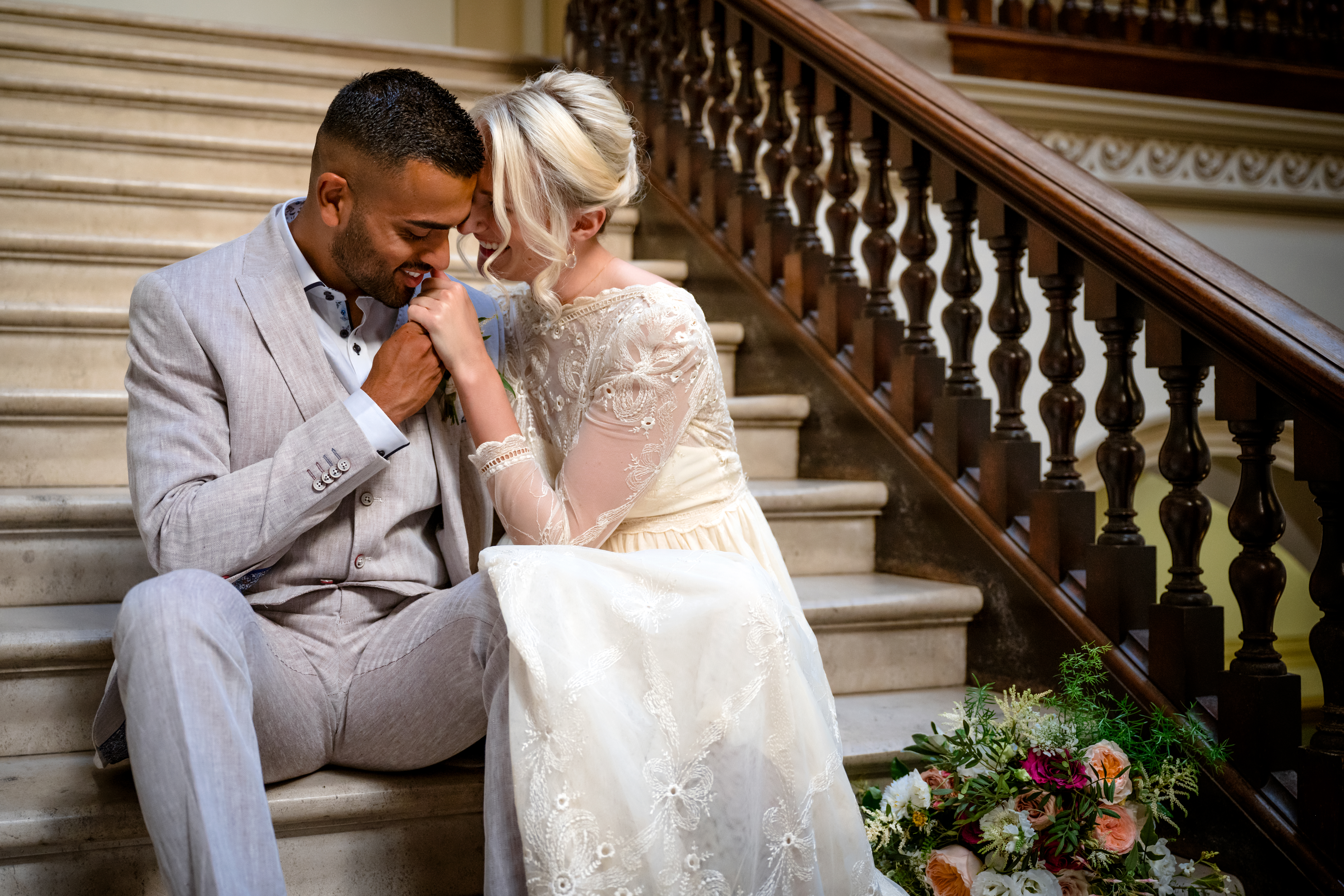 Couple seated on the Marble Staircase