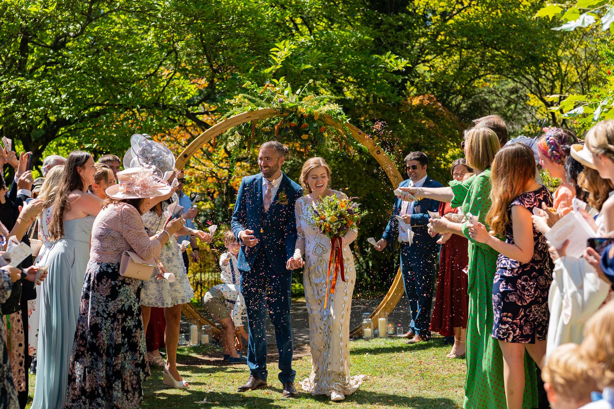 Confetti throwing in front of the Moon Gate, Bath Botanical Gardens