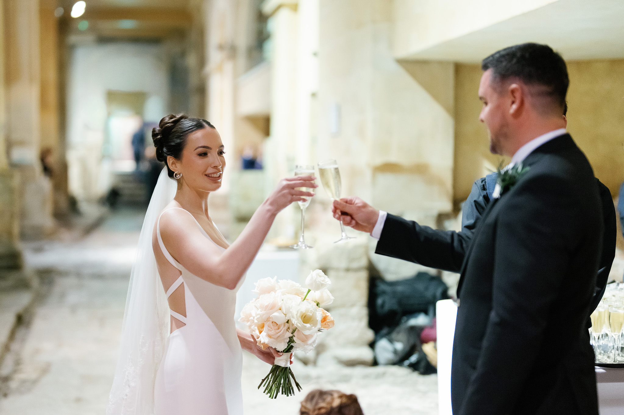 Couple celebrate beside the Great Bath