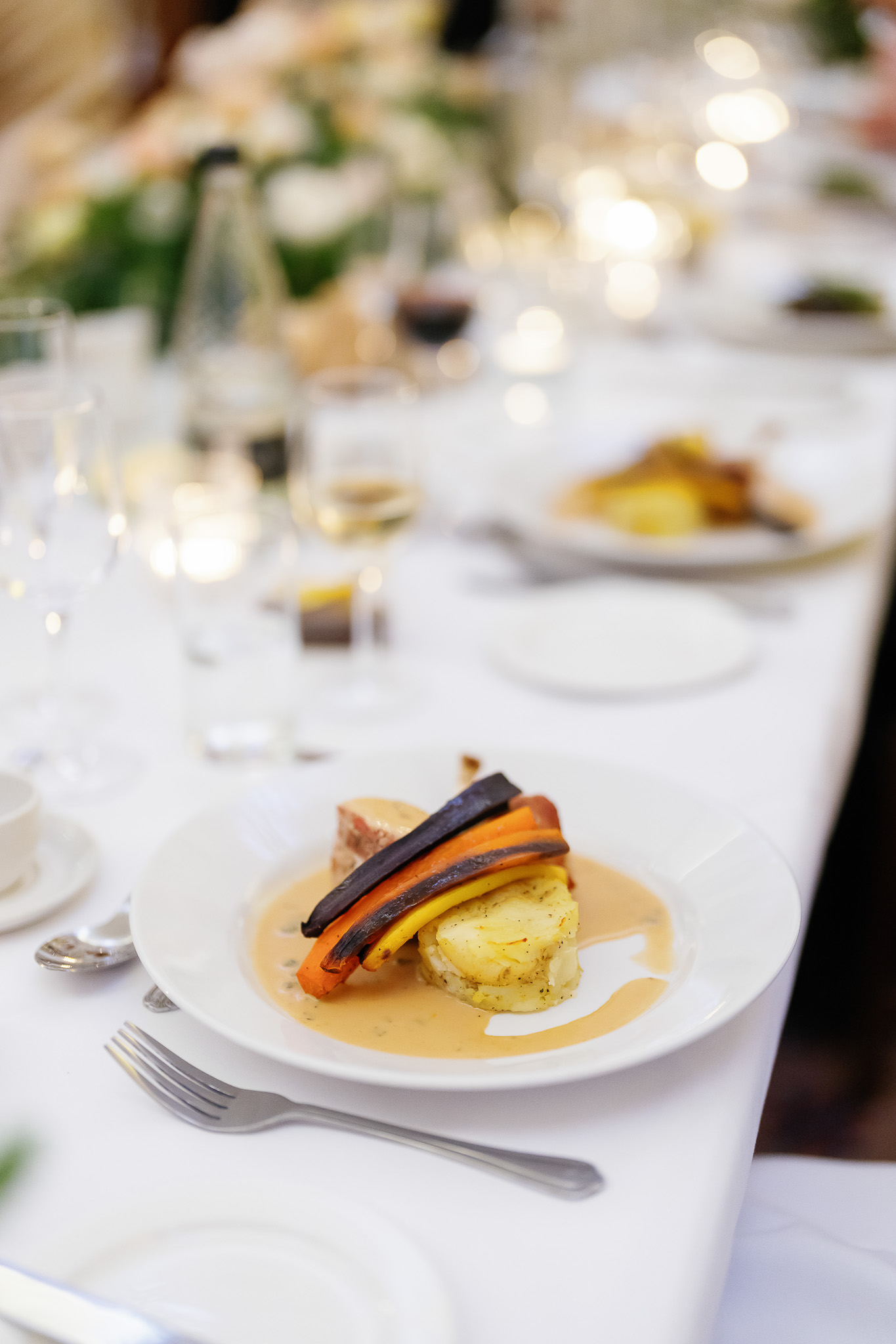 Chicken wrapped in pancetta, crushed potato, honey carrots, sage cream sauce