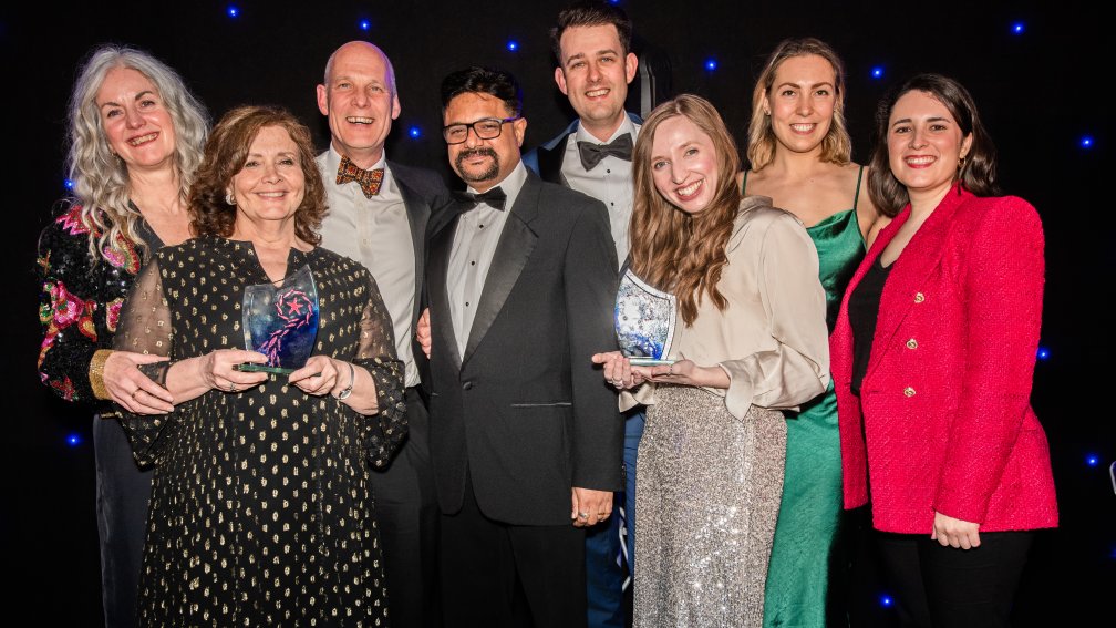 Staff with award