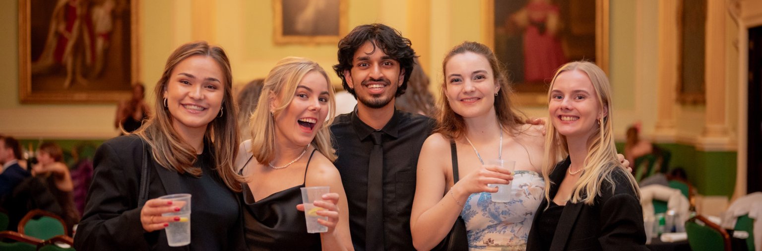 Students at an event in the Guildhall Banqueting Room