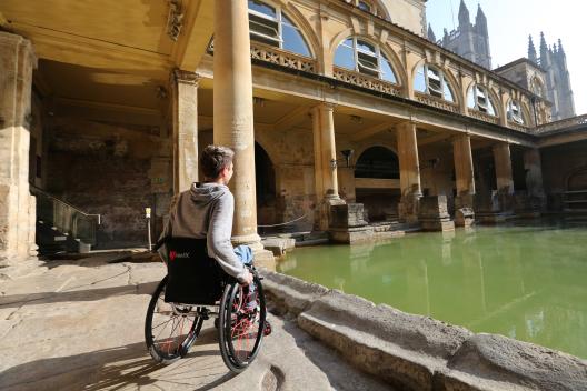 Visitor viewing the Great Bath