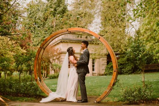 Couple beside Moon Gate, Temple of Minerva, Peachy Dreams