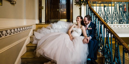 Wedding couple on the stairs, Babb Photo